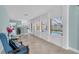 Sun room with views of the pool, neutral paint, and tile flooring at 4055 Floramar Ter, New Port Richey, FL 34652