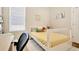 Bright bedroom with natural light, desk, and cozy rug, perfect for a space at 4093 Epic Cv, Land O Lakes, FL 34638