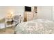 Bedroom with a desk and chair near the bed at 4093 Epic Cv, Land O Lakes, FL 34638