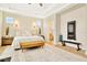 Spacious main bedroom featuring a bench, hardwood floors and ample closet space at 4093 Epic Cv, Land O Lakes, FL 34638