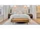 Comfortable main bedroom showcasing a large bed, accent lighting, and hardwood floors at 4093 Epic Cv, Land O Lakes, FL 34638