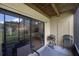A charming deck area perfect for relaxing and entertaining in the lovely backyard at 413 Somerset Ln, Palm Harbor, FL 34684