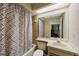 Cozy bathroom with tub, shower and a neutral vanity with lots of counter space at 413 Somerset Ln, Palm Harbor, FL 34684