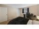 Comfortable bedroom featuring neutral walls, carpeted floors, and versatile layout at 413 Somerset Ln, Palm Harbor, FL 34684