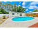 Private backyard pool area with a well-maintained patio, ideal for cooling off on hot days at 4228 Tarpon Se Dr, St Petersburg, FL 33705