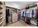 Spacious walk-in closet with custom shelving and ample storage at 4705 W Estrella St, Tampa, FL 33629