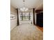 A spacious dining area boasts a large bay window with ample natural light at 4720 Coats Rd, Zephyrhills, FL 33541