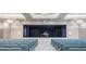 Elegant auditorium with a grand piano, stage, and comfortable seating for performances and events at 4914 Sienna Isles Ave, Wimauma, FL 33598