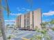 Spacious condo building with on-site parking, lush landscaping and easy access to nearby amenities at 51 Island Way # 503, Clearwater Beach, FL 33767