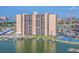 Waterfront condo building with marina, pool, tennis court, boat docks and balconies offering beautiful views at 51 Island Way # 503, Clearwater Beach, FL 33767