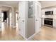 Hallway featuring many doors and access to kitchen with stainless appliances at 51 Island Way # 503, Clearwater Beach, FL 33767
