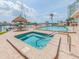 Relaxing pool area with a tiki hut, perfect for lounging and enjoying the waterfront views at 51 Island Way # 503, Clearwater Beach, FL 33767