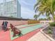 Outdoor shuffleboard courts with benches, offering recreational opportunities in a community setting at 51 Island Way # 503, Clearwater Beach, FL 33767