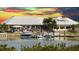 Picturesque waterfront restaurant with boat access, outdoor dining, and vibrant sunset views at 51 Island Way # 503, Clearwater Beach, FL 33767