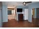 This large main bedroom has an open vanity area and a mirrored closet at 5714 Cheyenne St, Zephyrhills, FL 33542