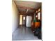 Spacious storage with a refrigerator, dresser and ample room for organization at 5714 Cheyenne St, Zephyrhills, FL 33542