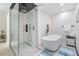 Elegant bathroom highlighting a glass shower, free-standing tub, and stylish design at 5744 150Th N Ave, Clearwater, FL 33760