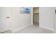 Hallway featuring modern decor and spacious closet at 5744 150Th N Ave, Clearwater, FL 33760