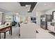 Open concept living space featuring a kitchen with stainless steel appliances and an island with seating at 5744 150Th N Ave, Clearwater, FL 33760