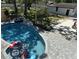 Inviting backyard pool with updated patio and landscaping, perfect for relaxation and entertainment at 5744 150Th N Ave, Clearwater, FL 33760