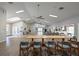 Large clubhouse space with modern flooring, a fireplace, and access to multiple areas at 5812 Garden Lakes Majestic, Bradenton, FL 34203