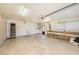Spacious garage with ample storage and workspace at 5905 Berkford Dr, Holiday, FL 34690