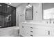 Chic bathroom with a black and white color scheme, walk-in shower, and double vanity at 607 W Euclid Ave # 3, Tampa, FL 33602