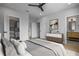 Bright bedroom features a ceiling fan, walk-in closet, and connecting bathroom at 607 W Euclid Ave # 3, Tampa, FL 33602