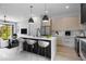 Modern kitchen features marble counters, sleek cabinets, and stainless steel appliances at 607 W Euclid Ave # 3, Tampa, FL 33602