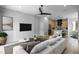 Bright living room connected to kitchen and dining, features modern lighting and decor at 607 W Euclid Ave # 3, Tampa, FL 33602
