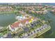 Beautiful aerial view showcases lakeside condos near community pool and amenities at 6100 Bahia Del Mar Cir # 105, St Petersburg, FL 33715
