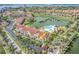 An aerial view showcases this lakefront condo's prime location near a community pool, perfect for relaxation at 6100 Bahia Del Mar Cir # 105, St Petersburg, FL 33715