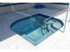 Inviting hot tub offers a tranquil space for relaxation, surrounded by a tiled deck at 6100 Bahia Del Mar Cir # 105, St Petersburg, FL 33715