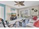 A bright and inviting living room with a sliding glass door to the lanai at 6100 Bahia Del Mar Cir # 105, St Petersburg, FL 33715