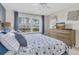 Bright bedroom with a large window, neutral decor, and comfortable furnishings at 6100 Bahia Del Mar Cir # 105, St Petersburg, FL 33715