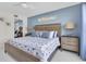 Comfortable primary bedroom featuring a large bed, and stylish beach-themed decor at 6100 Bahia Del Mar Cir # 105, St Petersburg, FL 33715