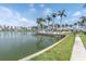 Relaxing waterfront community pool with lounge seating, perfect for enjoying warm sunny days at 6100 Bahia Del Mar Cir # 105, St Petersburg, FL 33715