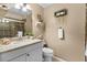 Neutral colored bathroom featuring a new sink, tile shower, and decorative elements at 6190 80Th N St # 102, St Petersburg, FL 33709