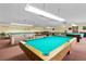 Well-lit billiards room offers multiple pool tables for residents to enjoy at 6190 80Th N St # 102, St Petersburg, FL 33709