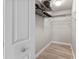 An organized closet with wire shelving offers plenty of storage space for your wardrobe and accessories at 6190 80Th N St # 102, St Petersburg, FL 33709