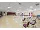Spacious community hall with stage, dance floor, and seating for large events at 6190 80Th N St # 102, St Petersburg, FL 33709