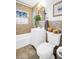 Well-lit bathroom featuring tiled walls, a white vanity, and modern fixtures for a clean aesthetic at 6713 31St N Ave, St Petersburg, FL 33710