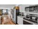 Well-equipped kitchen showcasing stainless steel appliances, granite countertops, and smooth access to the dining area at 6713 31St N Ave, St Petersburg, FL 33710