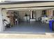 Spacious garage features ample storage, laundry area, and utility equipment at 7524 Oakshire Dr, Port Richey, FL 34668