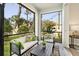 Cozy patio with comfortable seating and beautiful views of the landscaped backyard at 7798 93Rd N St # 1, Seminole, FL 33777