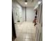 Versatile bonus room with tile flooring, offering flexible space for storage or hobbies, enhancing practicality at 821 Karen St, Palm Harbor, FL 34684
