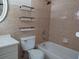 Bathroom featuring tiled shower and a sleek vanity with a contemporary design at 8503 N Willow Ave, Tampa, FL 33604