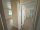 Hallway with views into adjoining rooms at 8503 N Willow Ave, Tampa, FL 33604