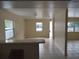 Bright living room featuring tile floors and large windows at 8503 N Willow Ave, Tampa, FL 33604