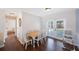 Bright dining area with a table and chairs, and access to the backyard through glass doors at 9043 108Th Ave, Seminole, FL 33777